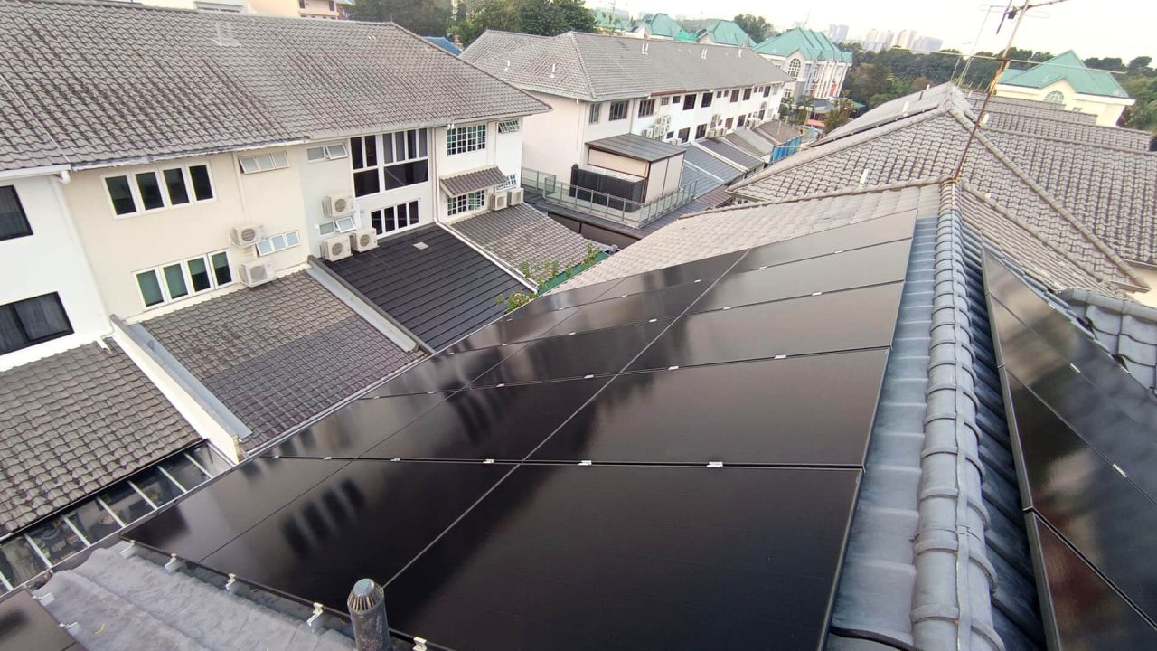 Solar panels installed by Huronis on the tiled roofs of terrace homes along Sunrise Avenue, Singapore
